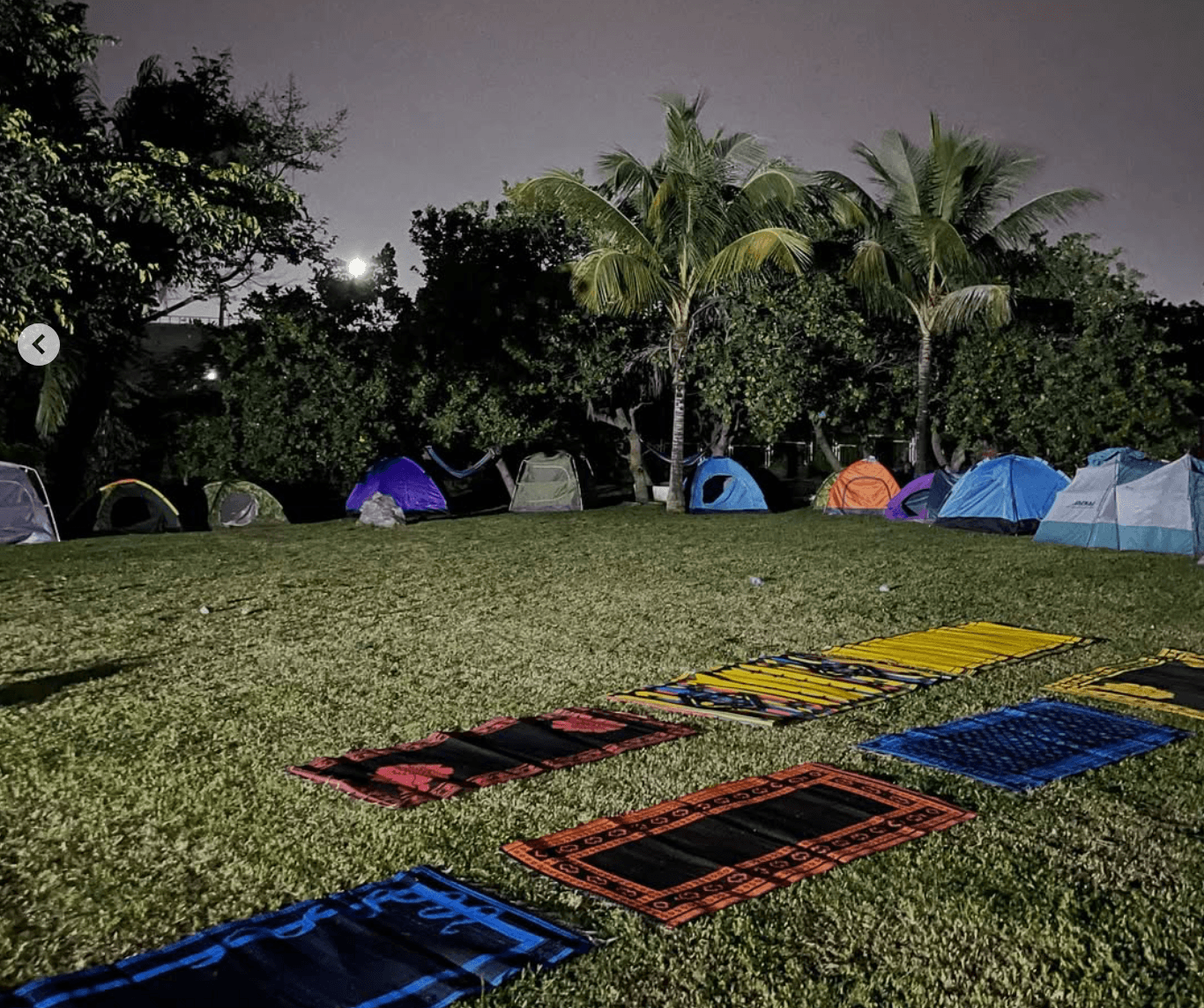A wide camping landscape at dusk